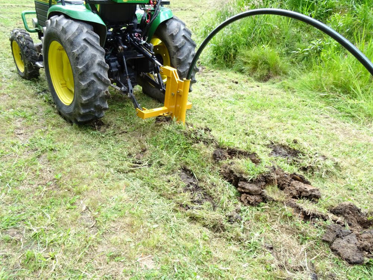 Single tine Ripple with pipe laying attachment